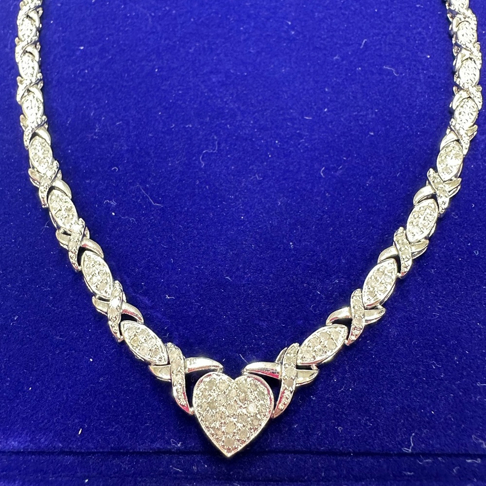 Brand new never worn silver necklace. 1 carat diamond encrusted.